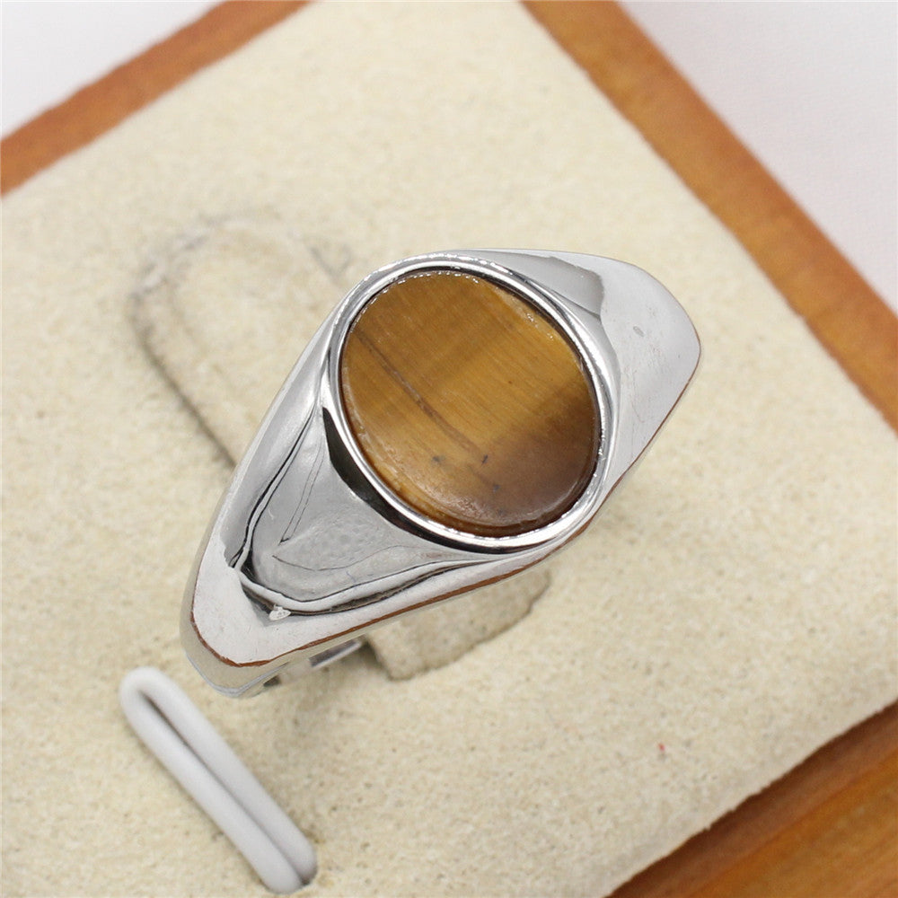 Modischer, minimalistischer ovaler Edelsteinring aus kühltonigem Titanstahl