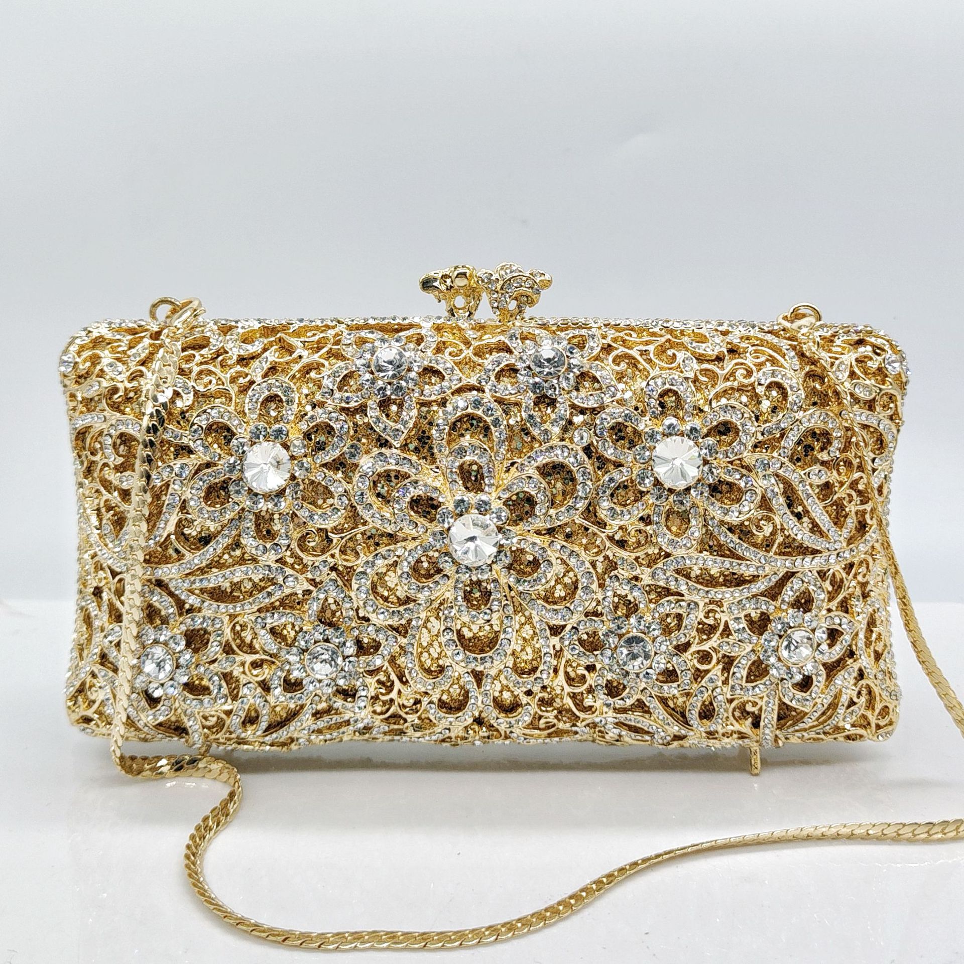 Abendclutch komplett aus Strass mit diamantbesetztem Design für Bankette