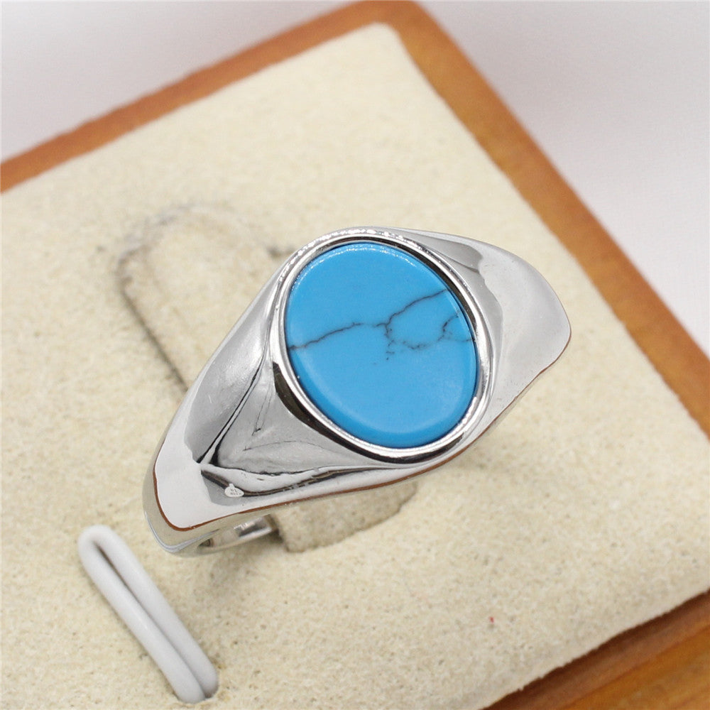 Modischer, minimalistischer ovaler Edelsteinring aus kühltonigem Titanstahl