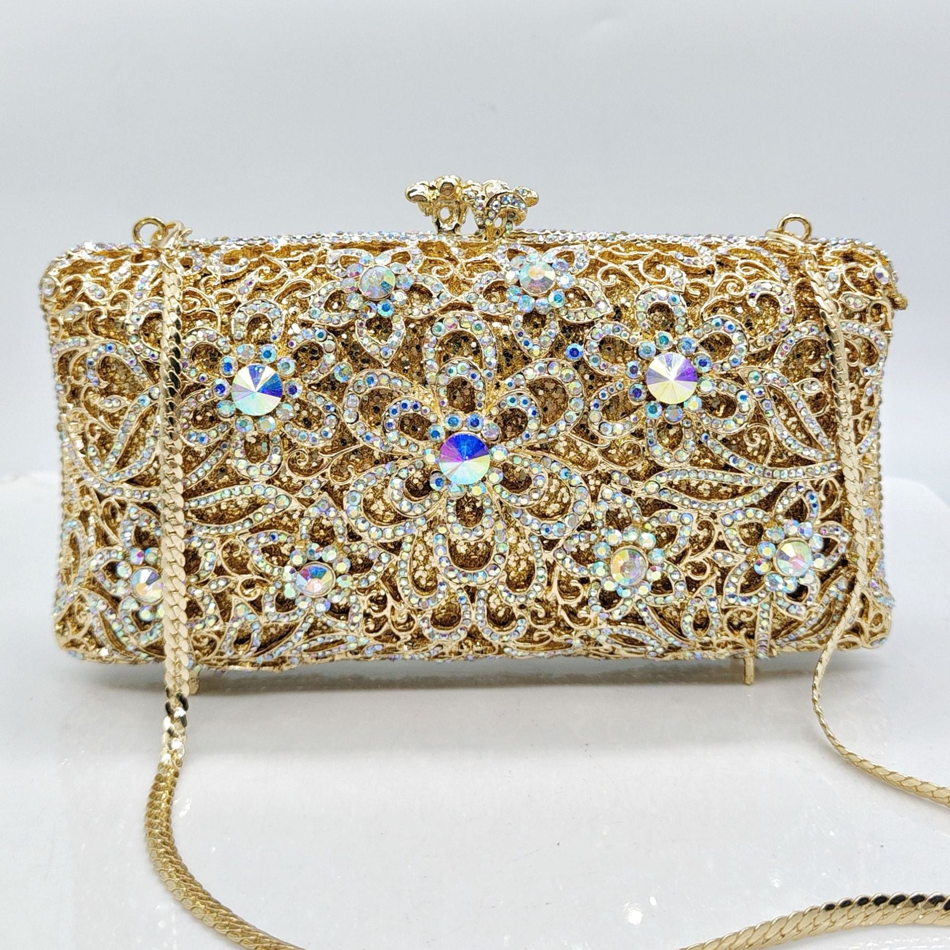 Abendclutch komplett aus Strass mit diamantbesetztem Design für Bankette